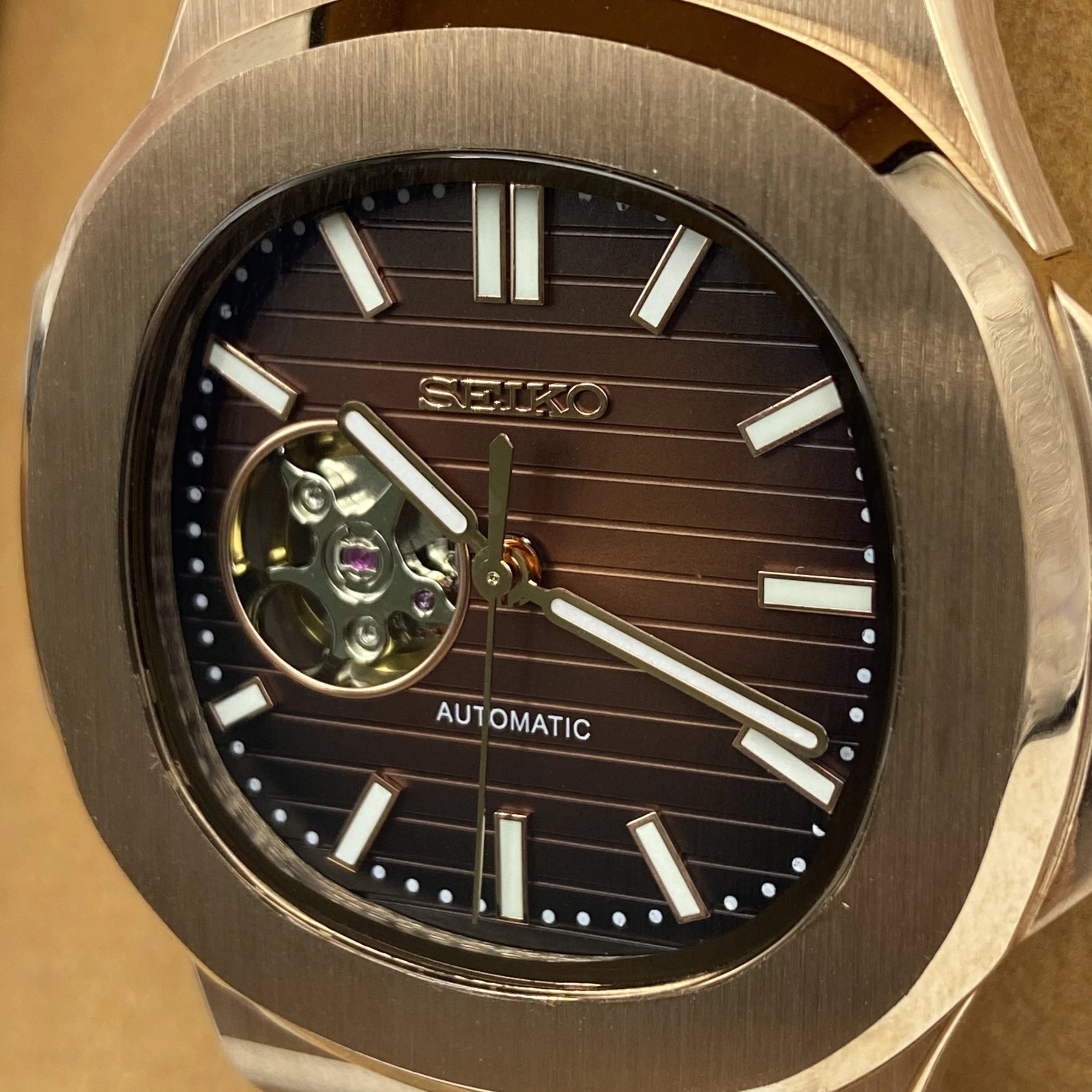 seiko-nautilus-chocolate-open-heart-left